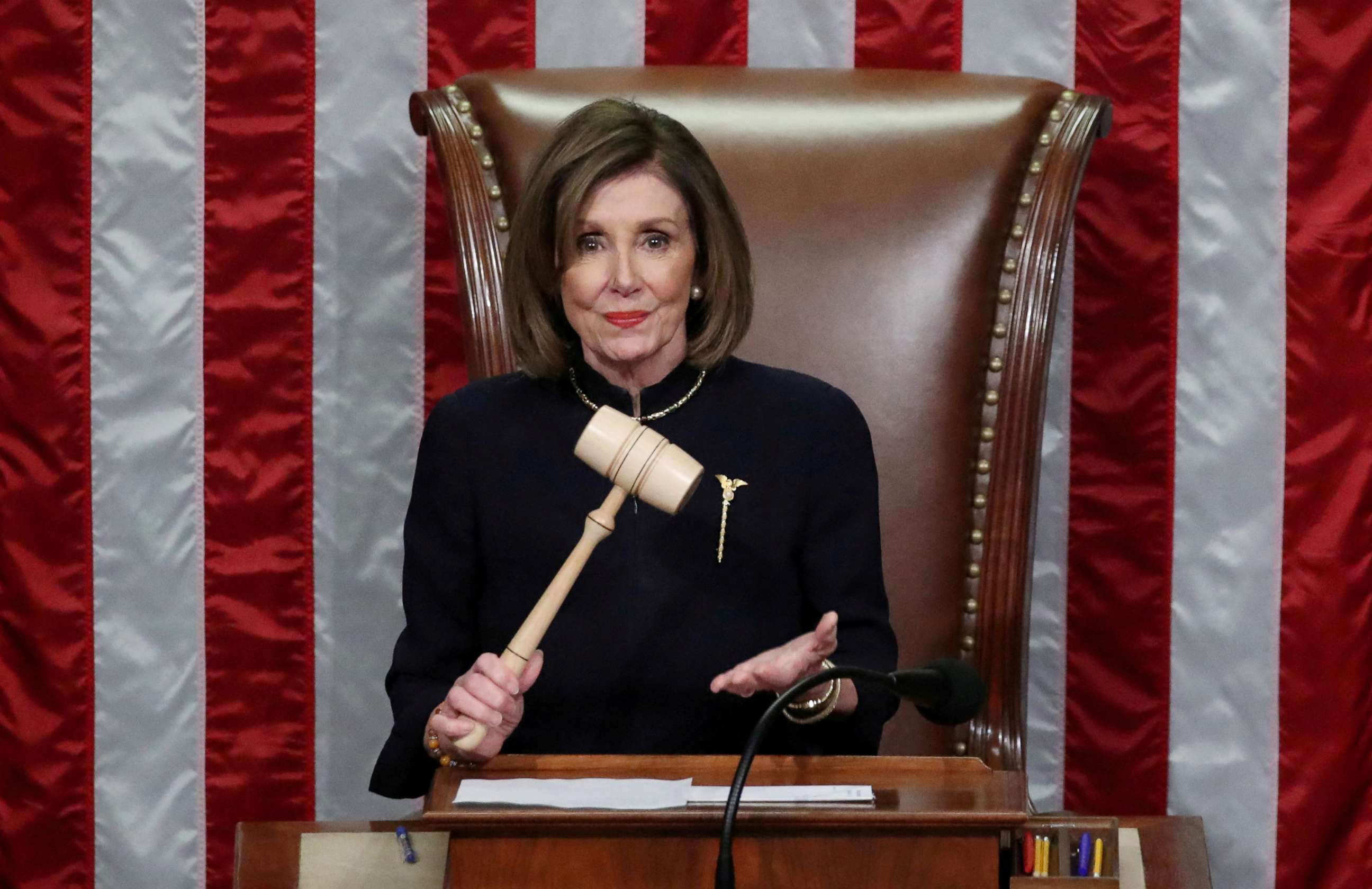 PHOTO: In this Dec. 18, 2019 file photo Speaker of the House Nancy Pelosi presides over the House of Representatives approving two counts of impeachment against U.S. President Donald Trump in the House Chamber of the U.S. Capitol in Washington.