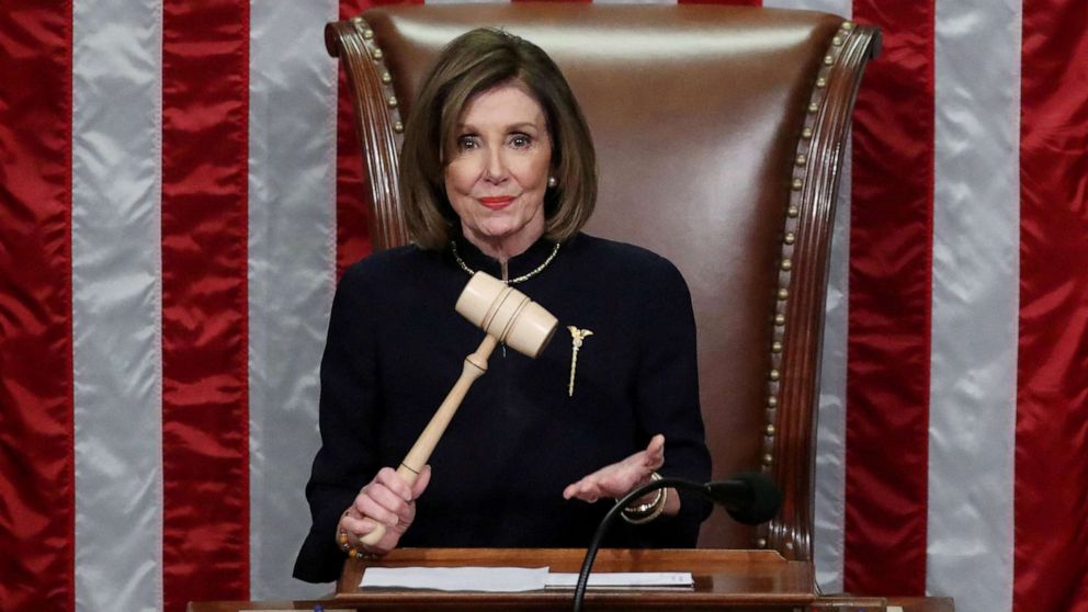  In this Dec. 18, 2019 record  photograph  Speaker of the House Nancy Pelosi presides implicit    the House of Representatives approving 2  counts of impeachment against U.S. President Donald Trump successful  the House Chamber of the U.S. Capitol successful  Washington.