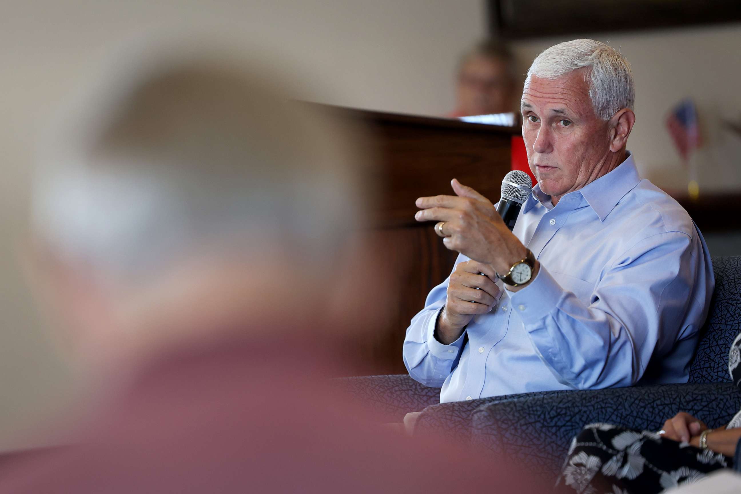 PHOTO: Former Vice president Mike Pence speaks with guests during a campaign stop he made with his wife Karen, July 6, 2023, in Holstein, Iowa.
