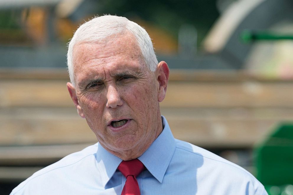 PHOTO: Republican presidential candidate and former Vice President Mike Pence speaks with the media during a stop at the Indiana State Fair, Aug. 2, 2023, in Indianapolis.