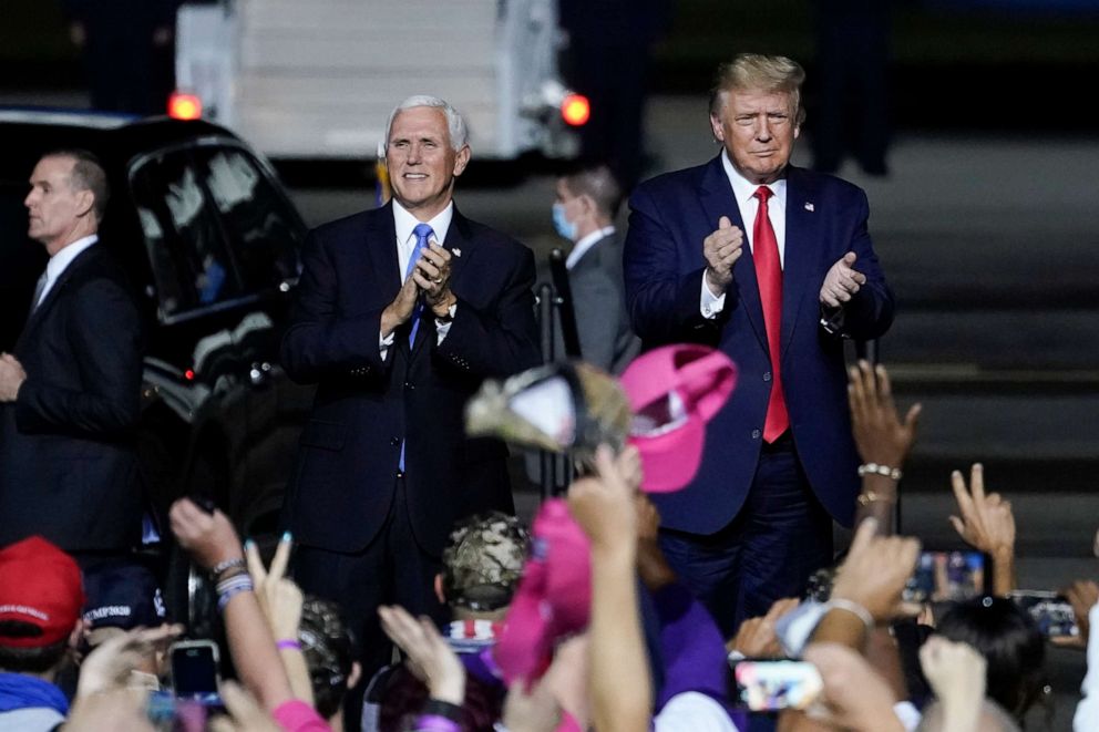 PHOTO: President Donald Trump and Vice President Mike Pence arrive for a campaign rally at Newport News/Williamsburg International Airport, Sept. 25, 2020, in Newport News, Va.  