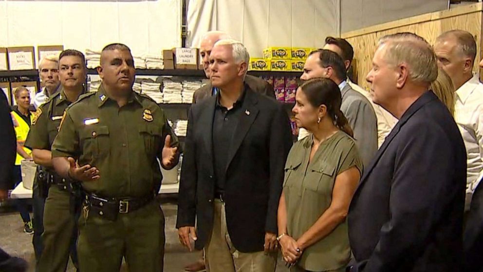 PHOTO: Vice President Mike Pence surveys the holding facility in Donna, Texas, July 12, 2019.