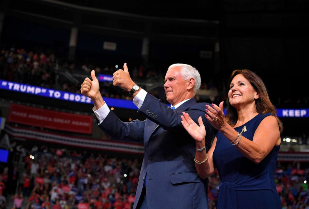 PHOTO: Vice President Mike Pence and Karen Pence arrive at a rally for US President Donald Trump, to officially launch the Trump 2020 campaign, at the Amway Center in Orlando, Fla., June 18, 2019. 