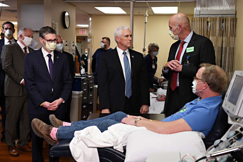 PHOTO: Vice President Mike Pence, not wearing a mask, tours Mayo Clinic facilities supporting the coronavirus disease (COVID-19) research and treatment, in Rochester, Minn., April 28, 2020. 