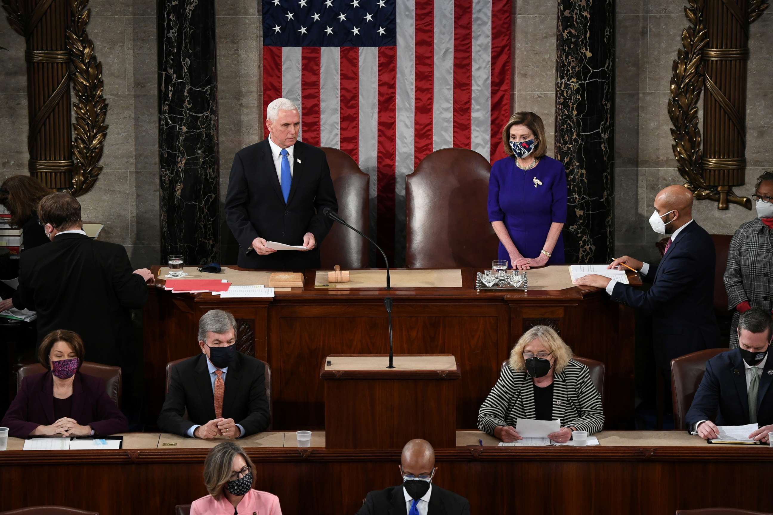 PHOTO: Vice President Mike Pence and Speaker of the House Nancy Pelosi take part in a joint session of Congress to certify the 2020 election results at the U.S. Capitol in Washington, D.C., Jan. 6, 2021.