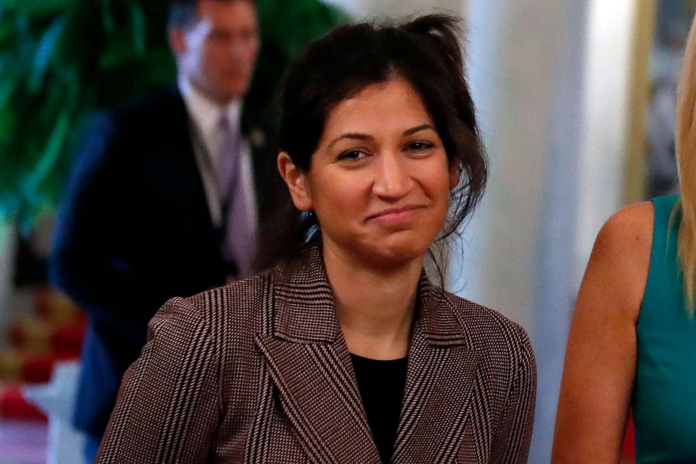 PHOTO: Katie Miller, press secretary for Vice President Mike Pence, listens as President Donald Trump speaks about reopening the country during a roundtable with industry executives in the State Dinning Room of the White House on April 29, 2020.