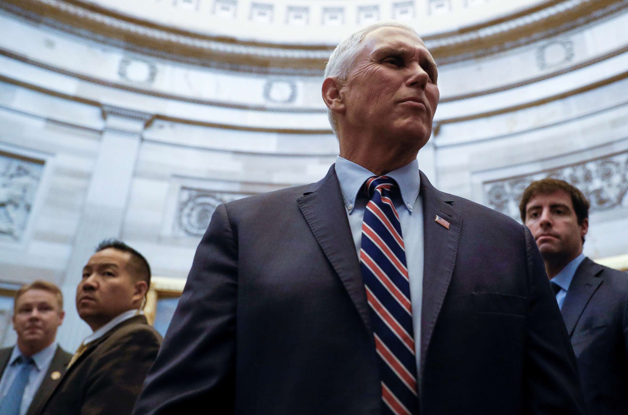PHOTO: Vice President Mike Pence talks with Capitol visitors after he attended the weekly Republican Senate policy luncheon on Capitol Hill in Washington, Dec. 17, 2019.