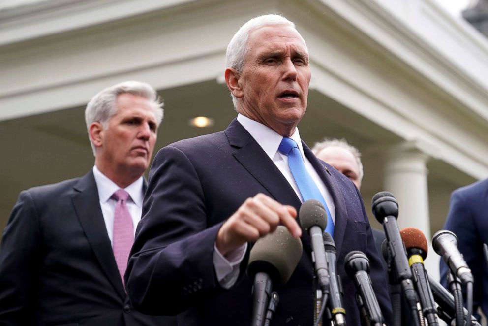 PHOTO: Vice President Mike Pence speaks as House Minority Leader Kevin McCarthy (R-CA) listens after a meeting with President Donald Trump and Congressional Democrats about the government partial shutdown at the White House, Jan. 9, 2019.