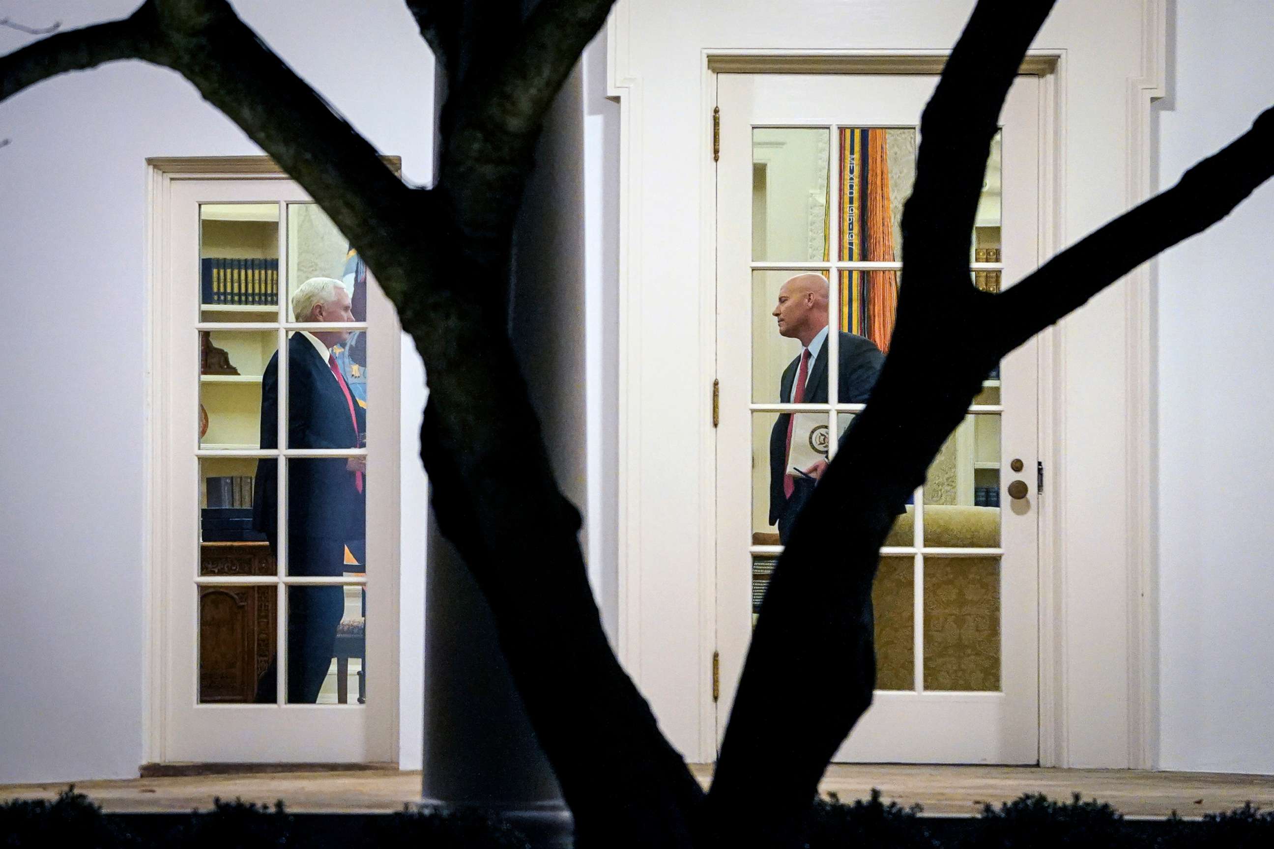 PHOTO: Vice President Mike Pence and his Chief of Staff Marc Short stand in the Oval Office before President Donald Trump departs the White House on Jan. 4, 2020 in Washington, D.C.