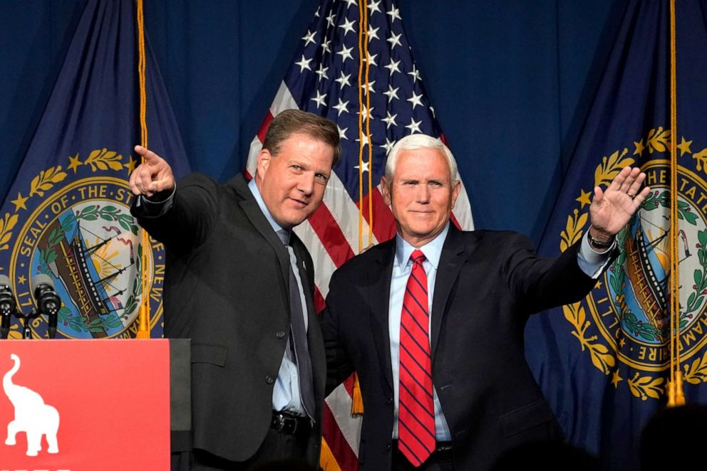 PHOTO: Former Vice President Mike Pence, right, waves as N.H. Gov. Chris Sununu introduces him at the annual Hillsborough County NH GOP Lincoln-Reagan Dinner, Thursday, June 3, 2021, in Manchester, N.H.