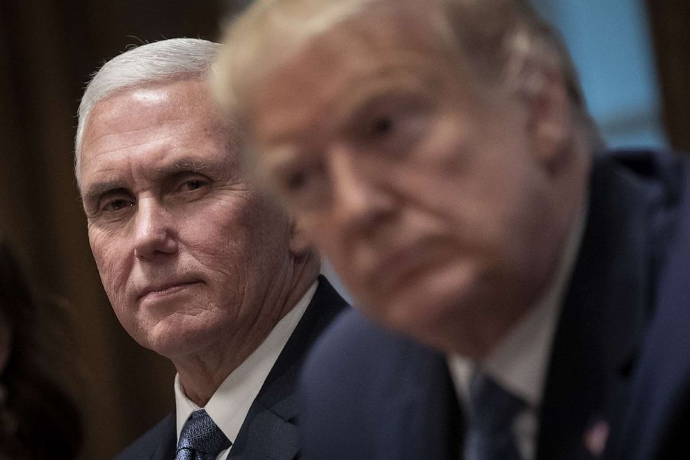 PHOTO: Vice President Mike Pence, left, and President Donald Trump listen during a meeting in the Cabinet Room of the White House on Dec. 16, 2019 in Washington.