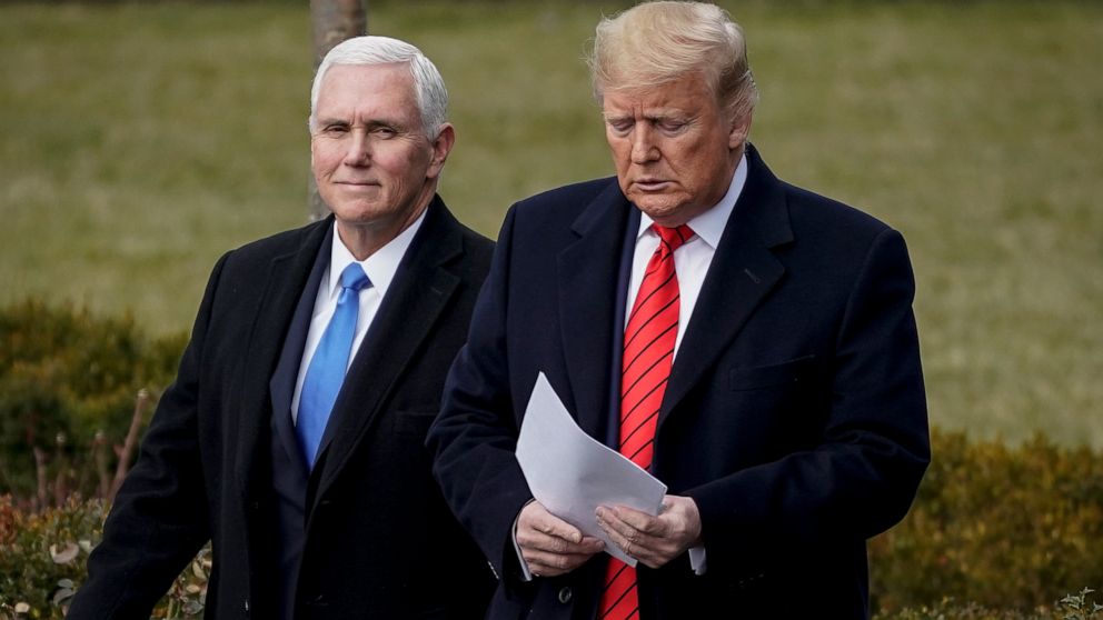 PHOTO: (L-R) Former Vice President Mike Pence and former President Donald Trump arrive for a signing ceremony for the United States-Mexico-Canada Trade Agreement on the South Lawn of the White House on Jan. 29, 2020 in Washington, DC.