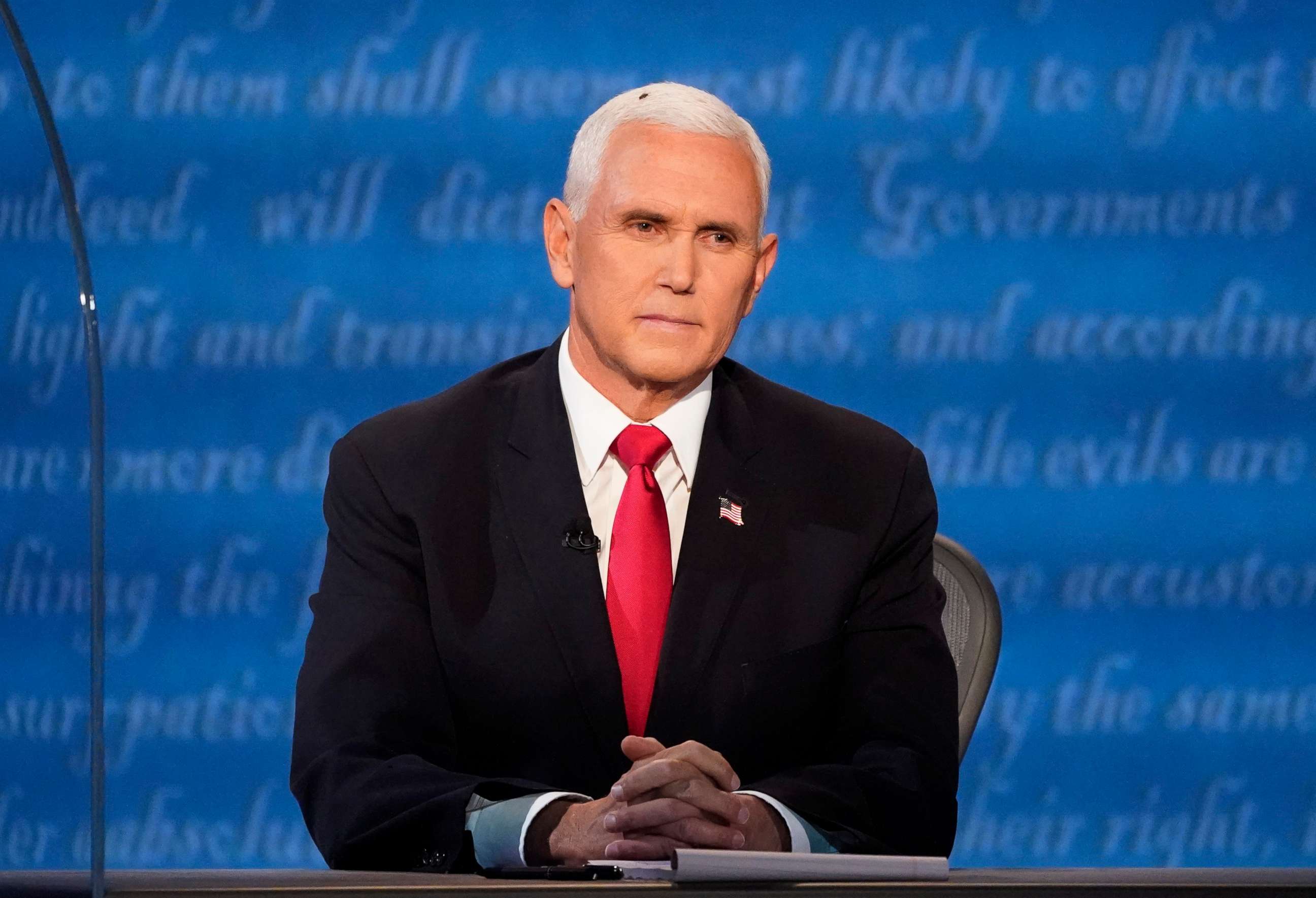 PHOTO: Vice President Mike Pence listens during the vice presidential debate, Oct. 7, 2020, at Kingsbury Hall on the campus of the University of Utah in Salt Lake City.