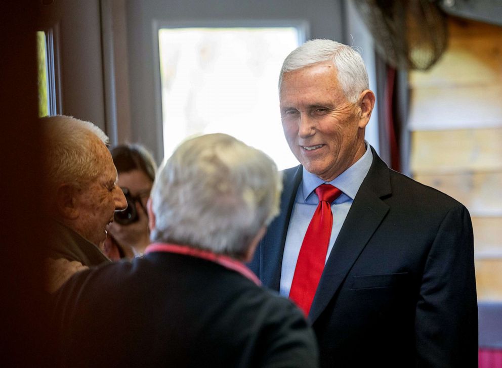 PHOTO: Former Vice President Mike Pence greets guests at a Lumber and Lobster event on May 17, 2023 in Dover, N.H.