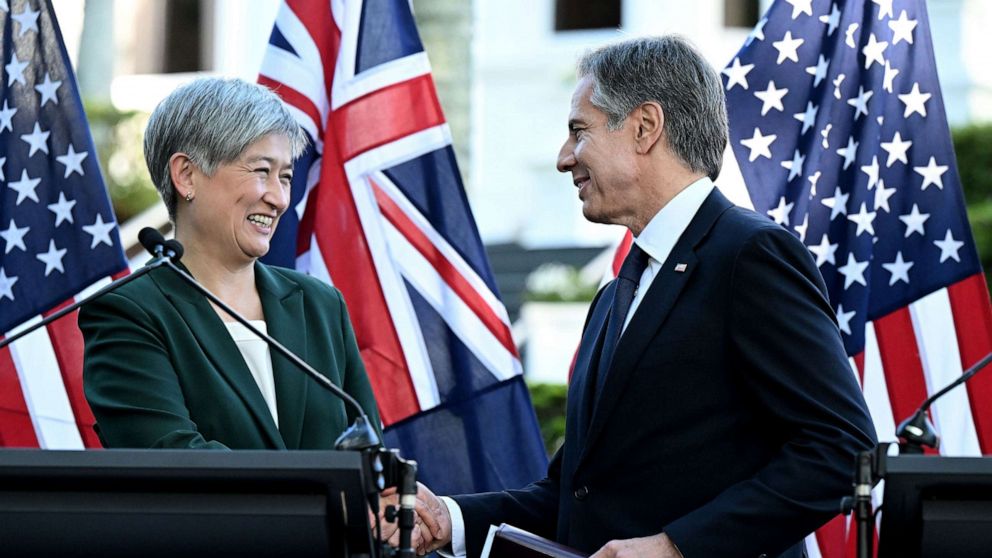 PHOTO: Australian Foreign Minister Penny Wong and US Secretary of State Antony Blinken shake hands as they attend a press conference after the Australia-US Ministerial Consultations (AUSMIN) at Government House in Brisbane, Australia, July 29, 2023.