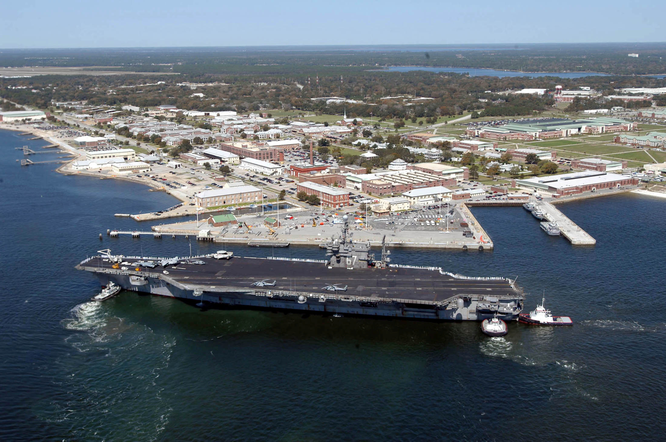 PHOTO: The aircraft carrier USS John F. Kennedy arrives for exercises at Naval Air Station Pensacola, Fla., March 17, 2004.