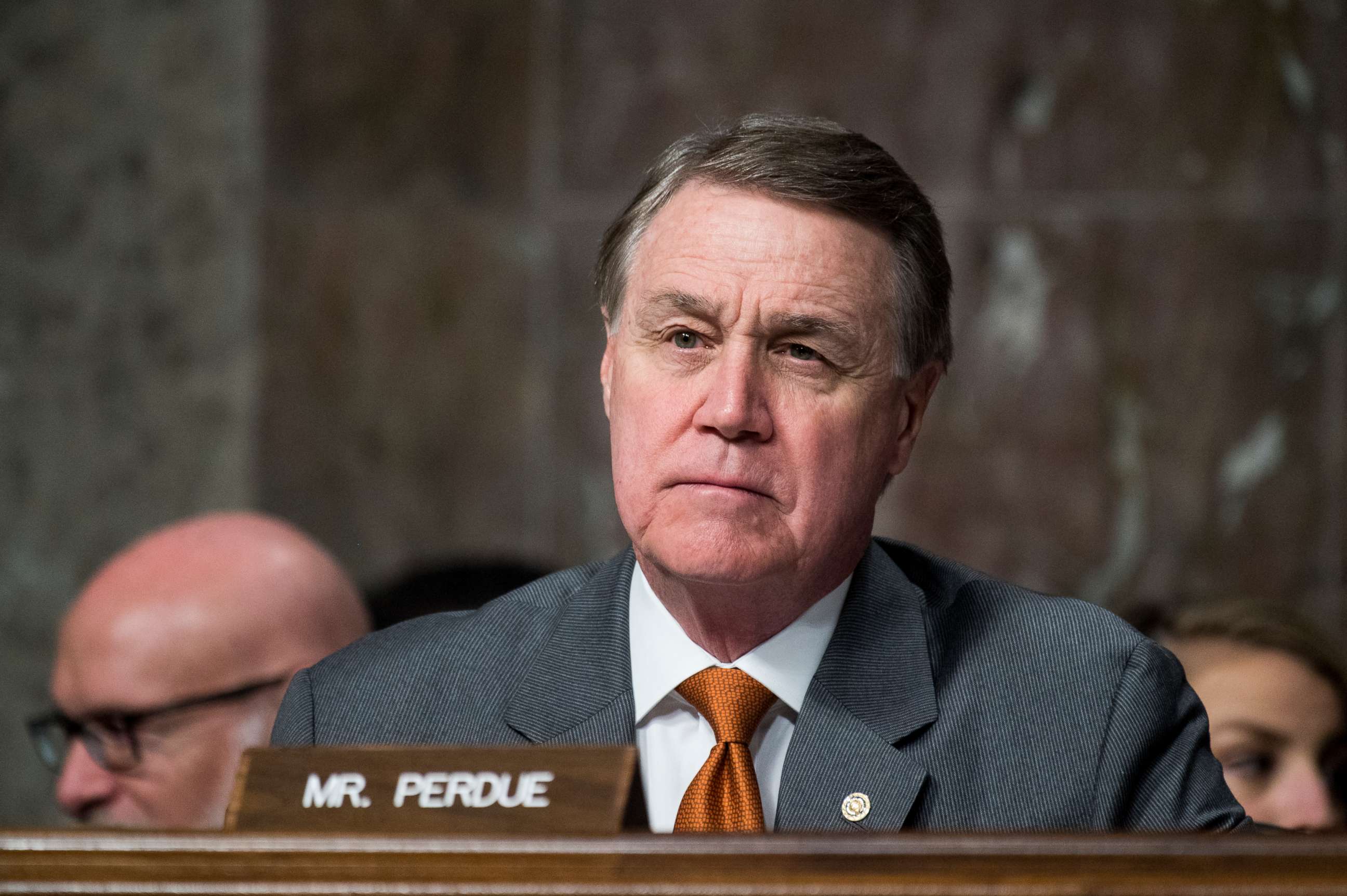 PHOTO: Sen. David Perdue listens during the Senate Armed Services Committee  hearing on privatized military housing on Tuesday, Dec. 3, 2019.