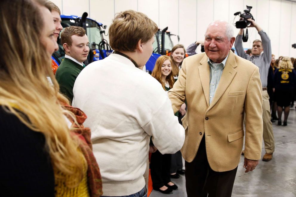 PHOTO: Agriculture Secretary Sonny Perdue, right, greets a youth group at the Wilson County Exposition Center Tuesday, Dec. 18, 2018, in Lebanon, Tenn. 