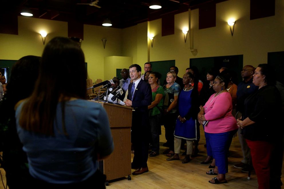 PHOTO: South Bend Mayor and 2020 presidential candidate Pete Buttigieg talks with reporters after meeting with community leaders to discuss policing policies in the community in South Bend, Ind., July 1, 2019.