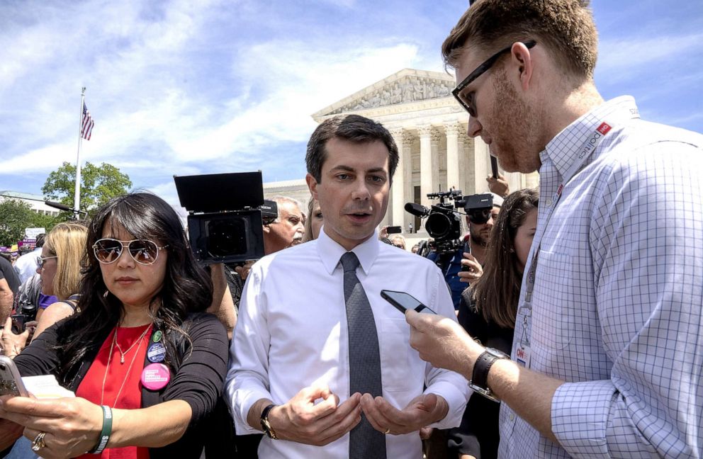 PHOTO: Democratic presidential candidate and mayor of South Bend, In., Pete Buttigieg, speaks to a reporter at a pro-choice rally at the Supreme Court on May 21, 2019, in Washington, D.C. 