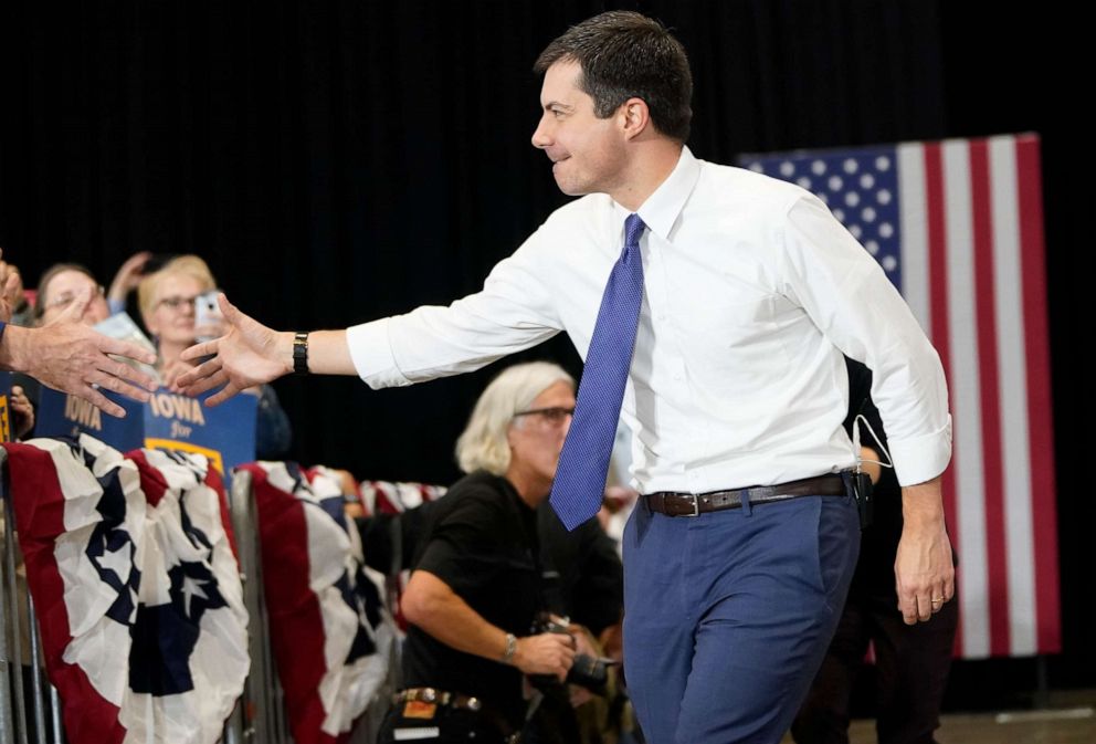 PHOTO: Democratic presidential candidate South Bend, Indiana Mayor Pete Buttigieg greets Iowa voters while arriving at a campaign event, Dec. 8, 2019, in Coralville, Iowa.