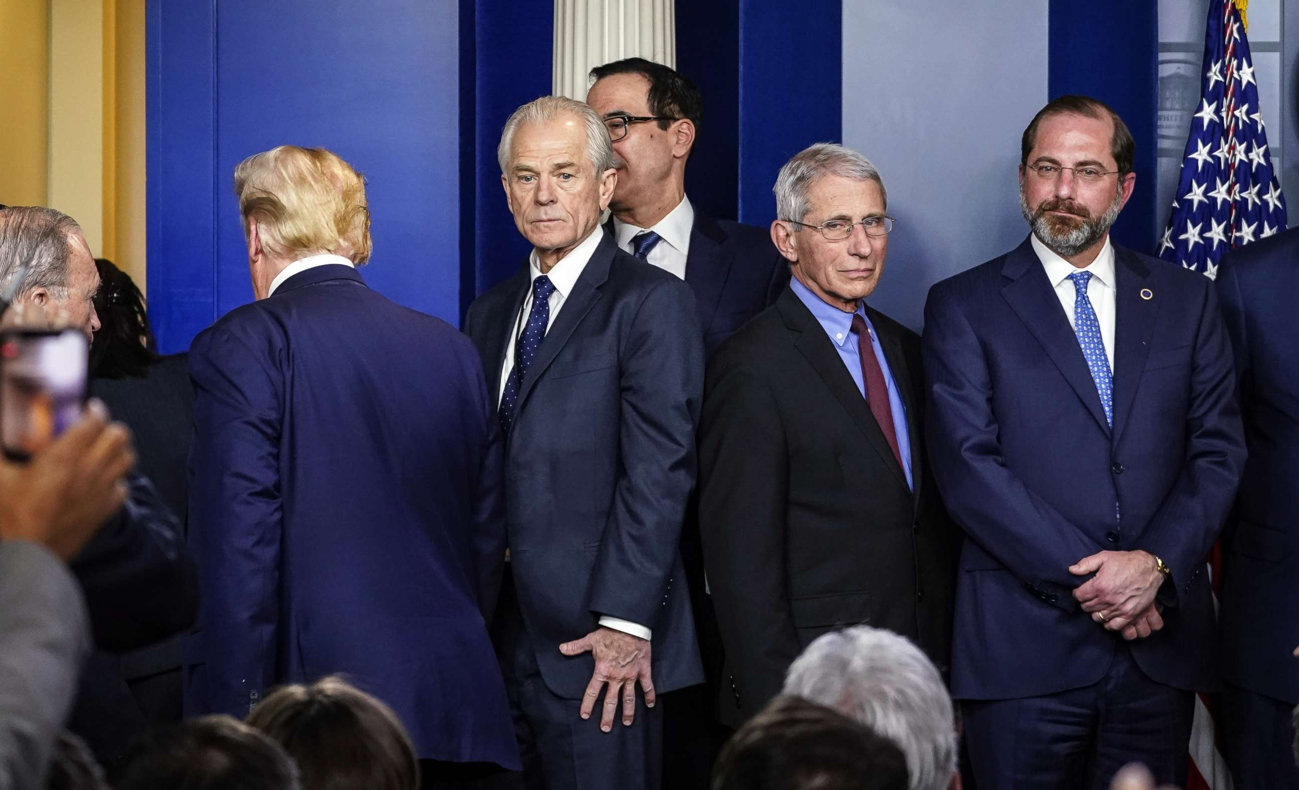 PHOTO: Economic Advisor Peter Navarro and Dr. Anthony Fauci, director of the National Institute of Allergy and Infectious Diseases, attend a press briefing in the White House after a meeting of the Coronavirus Task Force, in Washington, March 9, 2020.