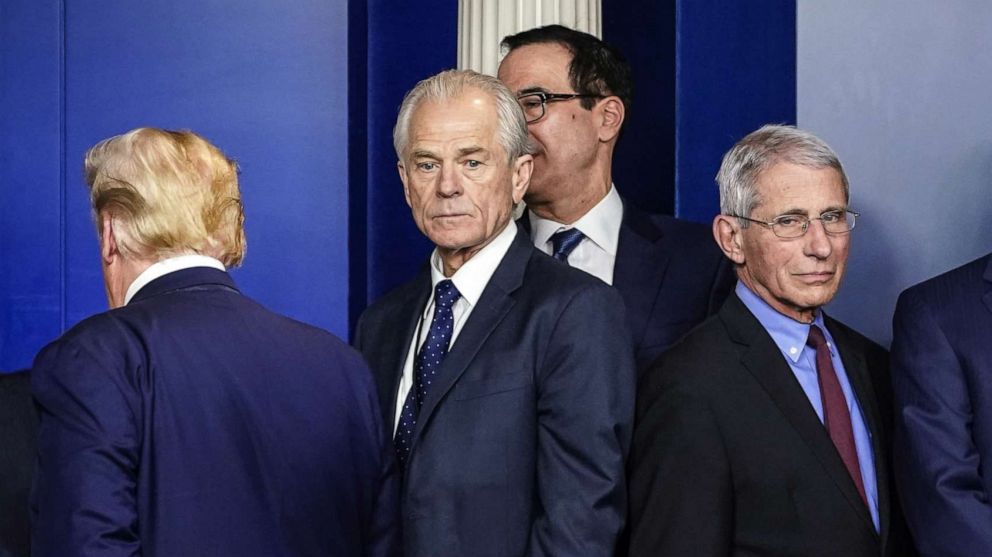 PHOTO: Economic Advisor Peter Navarro and Dr. Anthony Fauci, director of the National Institute of Allergy and Infectious Diseases, attend a press briefing in the White House after a meeting of the Coronavirus Task Force, in Washington, March 9, 2020.