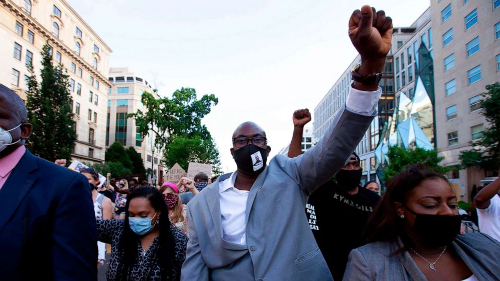 PHOTO: Philonise Floyd, a brother of George Floyd march with others on Black Lives Matter Plaza street near the White House, to protest police brutality and racism, June 10, 2020 in Washington, DC. 