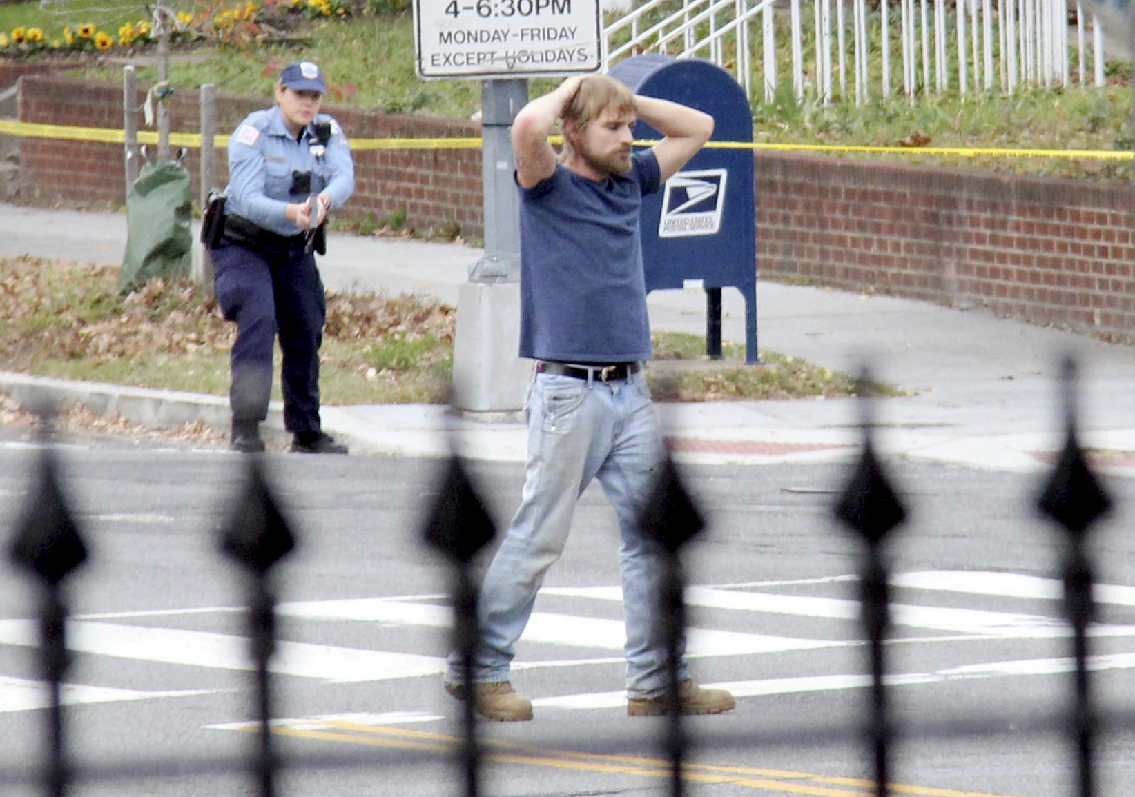 PHOTO: Edgar Maddison Welch surrenders to police in Washington, Dec. 4, 2016. Welch fired an assault rifle inside a pizza restaurant while investigating a child sex ring conspiracy theory. He is set to be sentenced in federal court on Sept. 3. 2020.