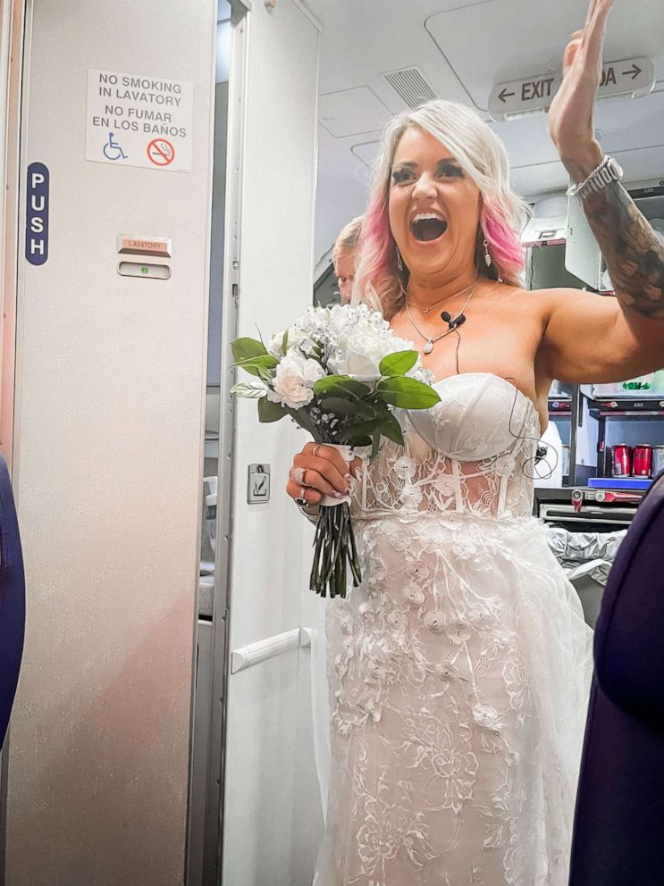PHOTO: Pam and Jeremy Salda were traveling to Las Vegas to get married when their flight was cancelled. With the help of the pilot's captain, flight crew and other passengers, the two were married about 37,000 feet in the air.