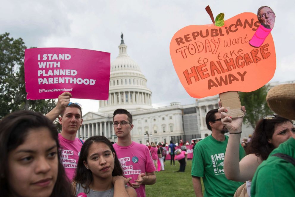 PHOTO: In this file photo, Supporters of Planned Parenthood hold a rally as they protest the US Senate  Republicans' healthcare bill outside the US Capitol in Washington, DC, June 27, 2017.