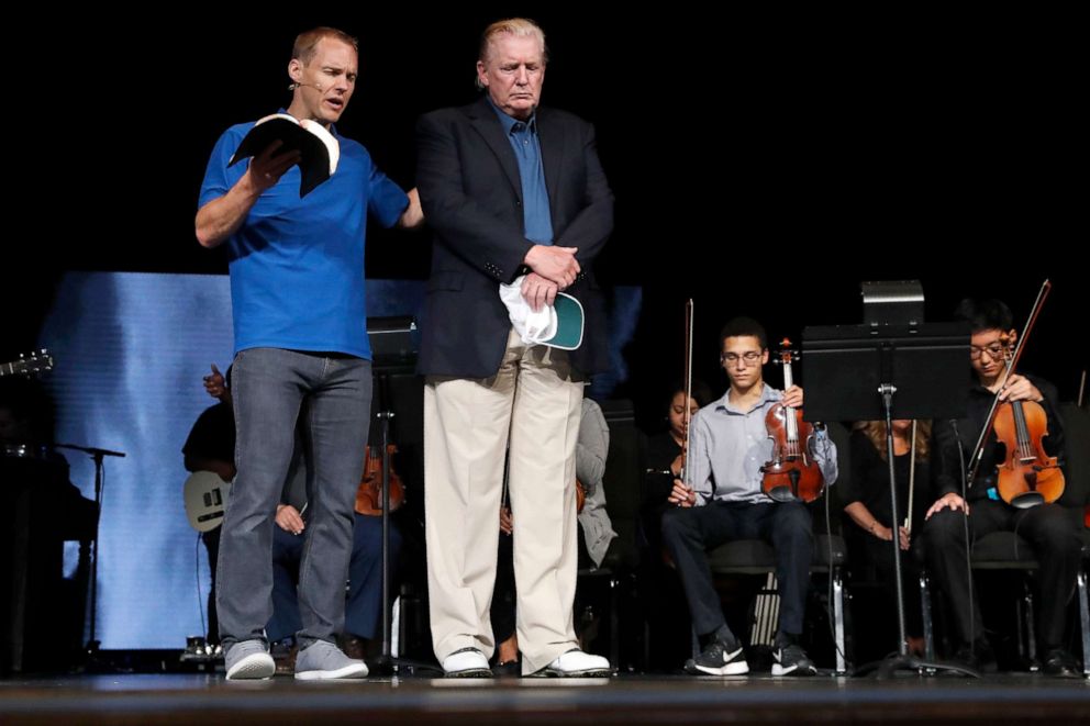 PHOTO: Pastor David Platt, left, prays for President Donald Trump, at McLean Bible Church, Vienna, Virginia, June 2, 2019.