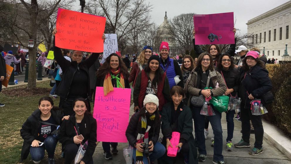 Dana Pogorzelski, fourth from right, a leading member of a grassroots organization in New Jersey called 25/11, poses for a photo with a group of her neighbors at the Women's March in Washington D.C., Jan. 21, 2017.
