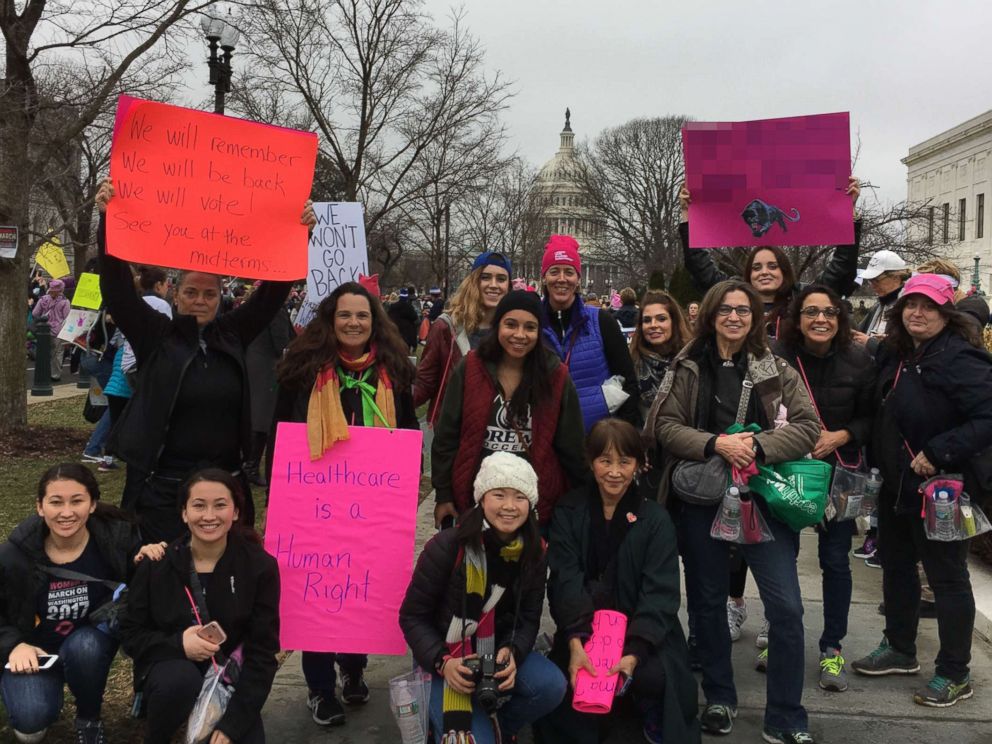 PHOTO: Dana Pogorzelski, fourth from right, a leading member of a grassroots organization in New Jersey called 25/11, poses for a photo with a group of her neighbors at the Womens March in Washington, Jan. 21, 2017.