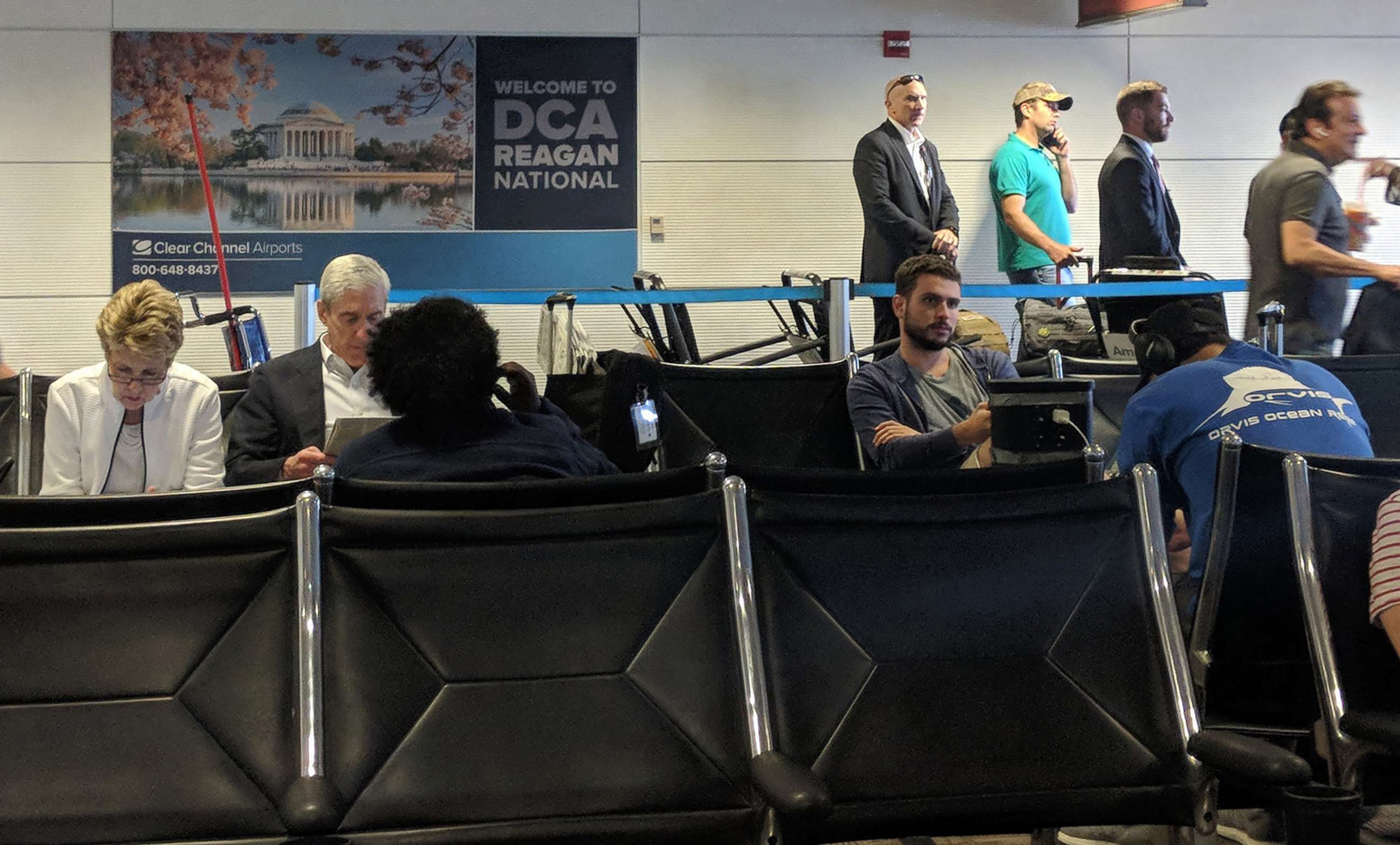 PHOTO: Robert Mueller and Donald Trump Jr. wait at Reagan National Airport outside Washington, D.C., July 27, 2018.