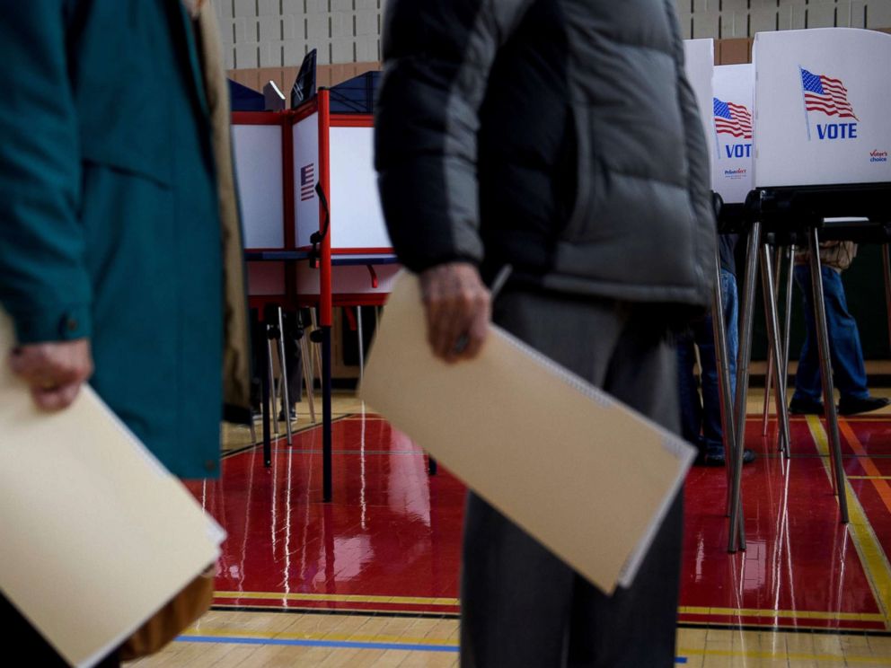 PHOTO: People wait to cast their ballots during early voting at a community center, Oct. 25, 2018, in Potomac, Md., two weeks ahead of the key US midterm polls.