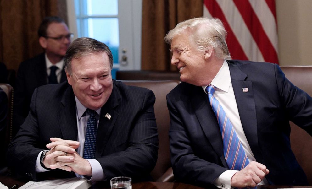 PHOTO: Secretary of State Mike Pompeo and President Trump share a laugh during a cabinet meeting with U.S. President Donald Trump in the Cabinet Room of the White House, July 18, 2018 in Washington, DC.