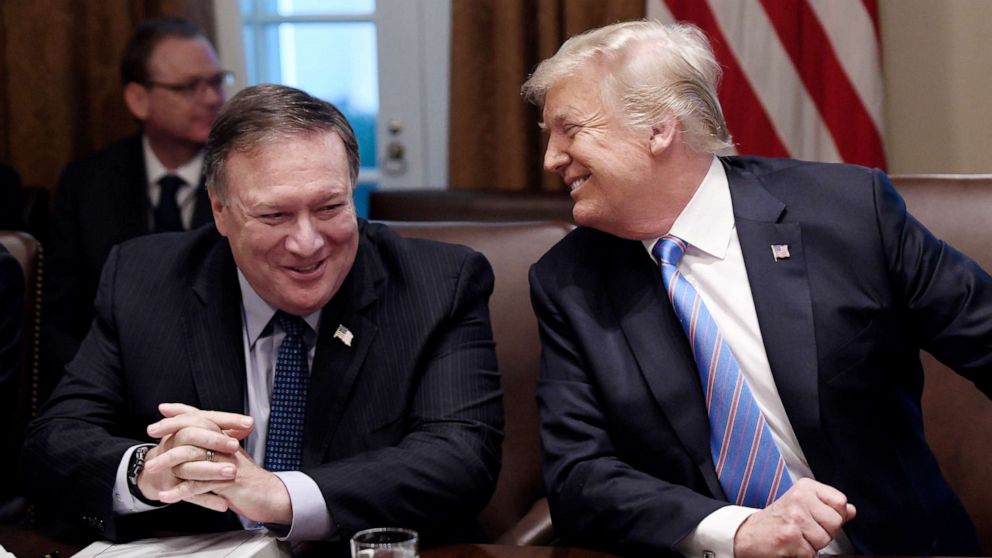 PHOTO: Secretary of State Mike Pompeo and President Trump share a laugh during a cabinet meeting with U.S. President Donald Trump in the Cabinet Room of the White House, July 18, 2018 in Washington, DC.
