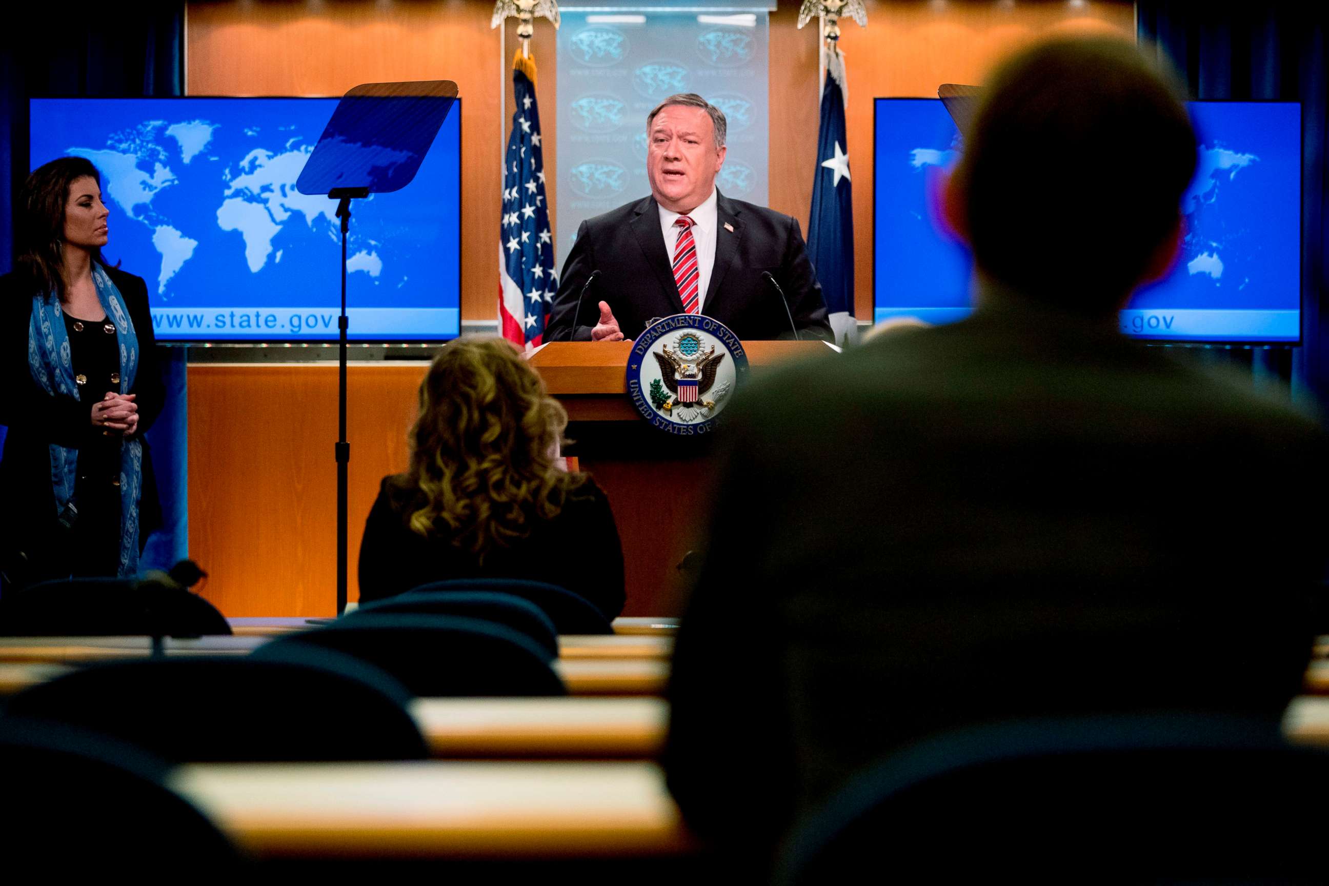 PHOTO: US Secretary of State Mike Pompeo, accompanied by State Department spokeswoman Morgan Ortagus(L) speaks at a news conference at the State Department on April 29, 2020, in Washington,DC.