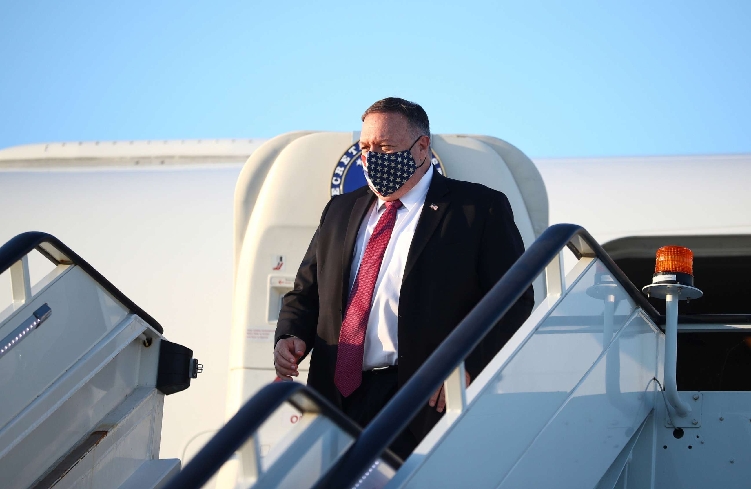 PHOTO: Secretary of State Mike Pompeo disembarks an airplane in London, July 20, 2020.