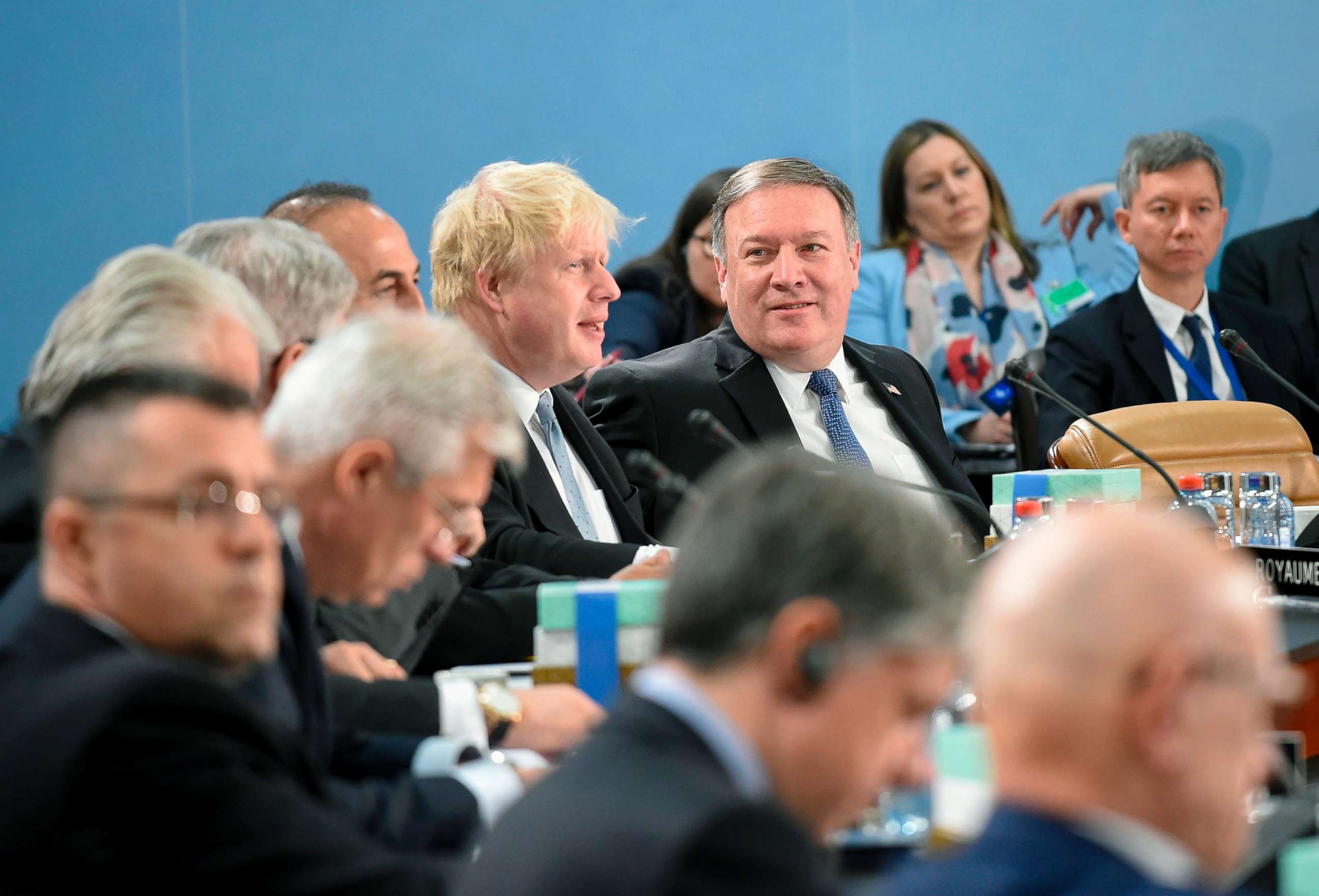 PHOTO: British Foreign Secretary Boris Johnson, left, talks with U.S. Secretary of State Mike Pompeo, right, during a NATO Foreign ministers' meeting at the NATO headquarters in Brussels on April 27, 2018.