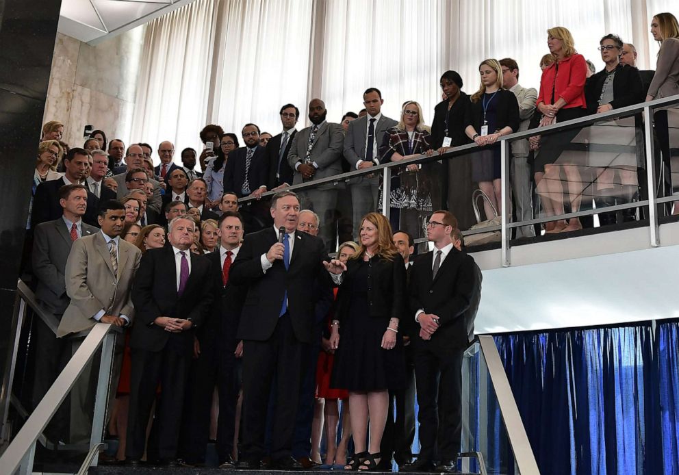 PHOTO: Secretary of State Mike Pompeo (C) delivers remarks to State Department employees upon his arrival to the department on May 1, 2018 in Washington, D.C.