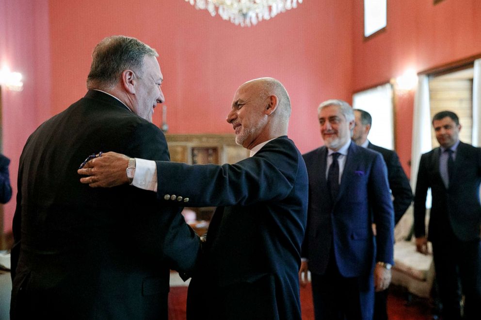 PHOTO: Secretary of State Mike Pompeo, left, is greeted by Afghan President Ashraf Ghani, at the Presidential Palace in Kabul, Afghanistan, June 25, 2019, during an unannounced visit. At right is Afghan Chief Executive Officer Abdullah Abdullah.