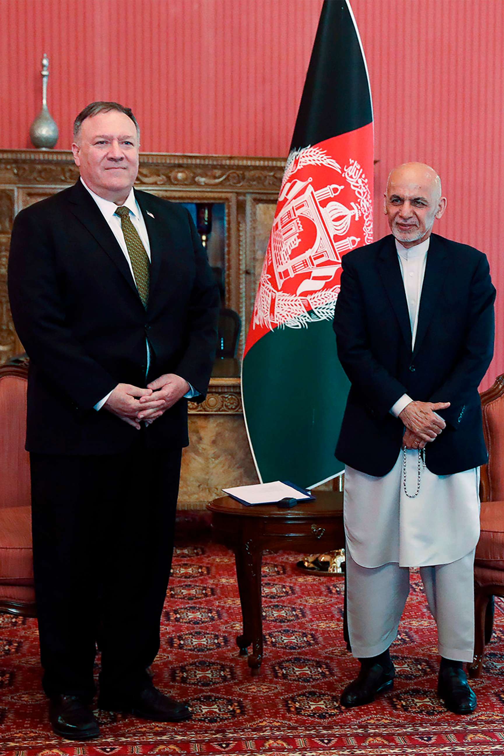 PHOTO: Afghanistan's President Ashraf Ghani poses for a picture with U.S. Secretary of State Mike Pompeo, left, during their meeting in Kabul, March 23, 2020.