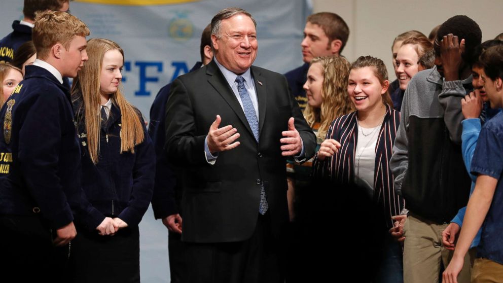 PHOTO: Secretary of State Mike Pompeo, center, talks with students after speaking to the Future Farmers of America and Johnston High School students, March 4, 2019, in Johnston, Iowa.
