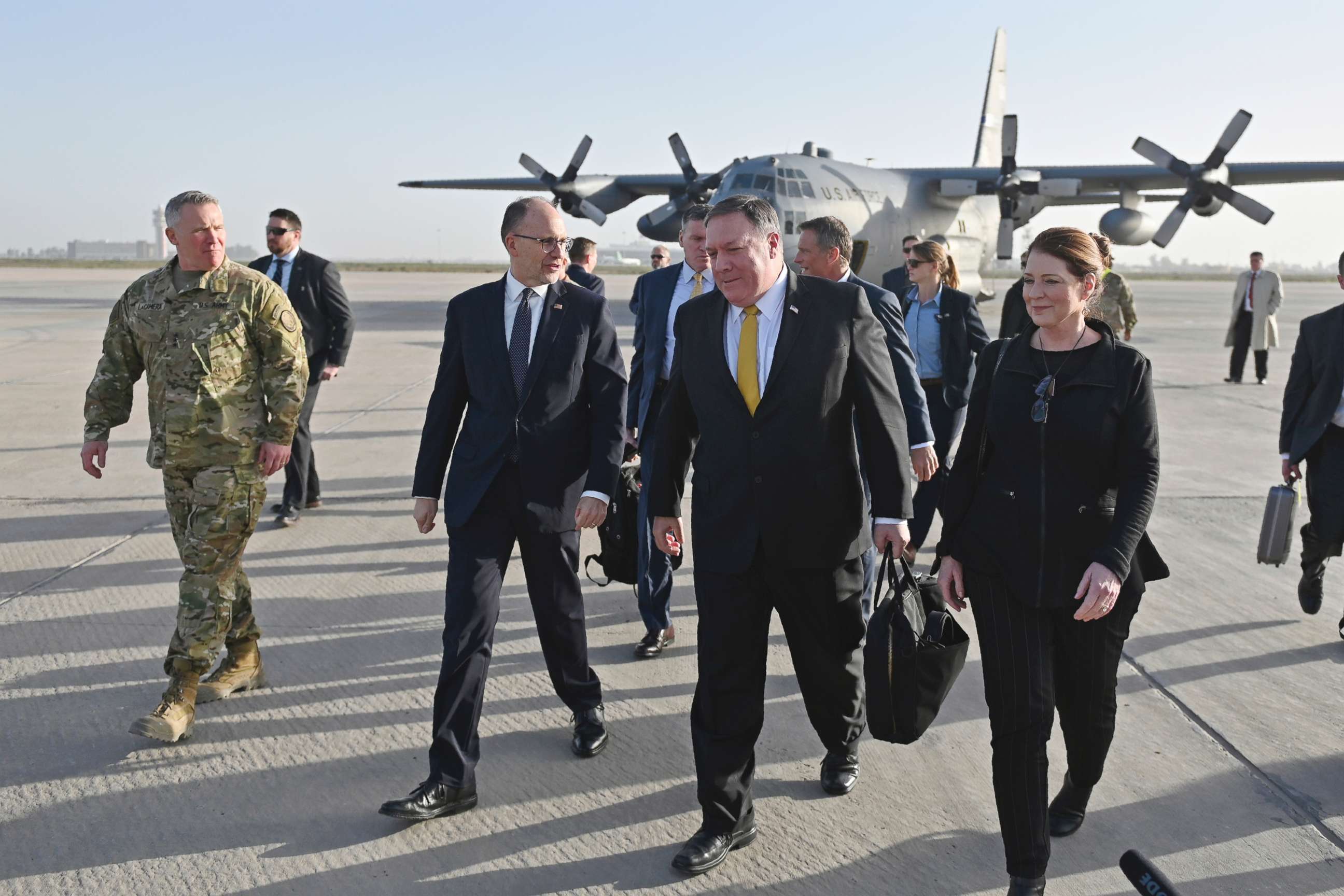 PHOTO: Secretary of State Mike Pompeo, second right, and his wife Susan, right, is welcomed by U.S. ambassador to Iraq Douglas Silliman, second left, as they arrive in Baghdad, Iraq, during a Middle East tour, Jan. 9, 2019.