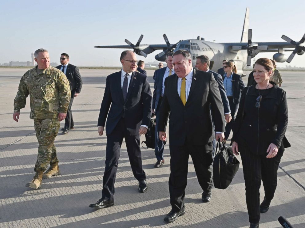 PHOTO: Secretary of State Mike Pompeo, second right, and his wife Susan, right, is welcomed by U.S. ambassador to Iraq Douglas Silliman, second left, as they arrive in Baghdad, Iraq, during a Middle East tour, Jan. 9, 2019.