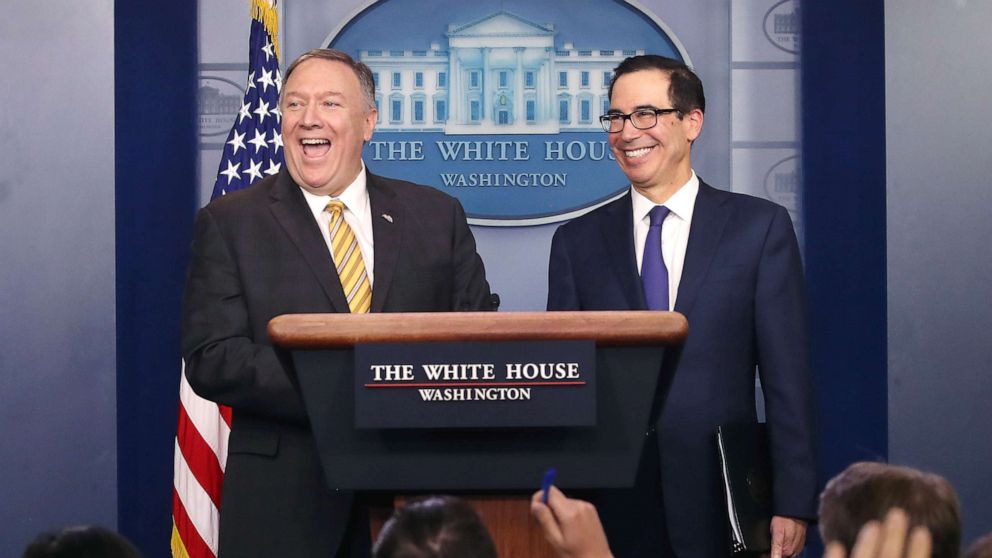 PHOTO: Secretary of State Mike Pompeo and Treasury Secretary Steven Mnuchin laugh in the James Brady briefing room at the White House, Sept. 10, 2019. 