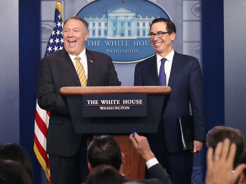 PHOTO: Secretary of State Mike Pompeo and Treasury Secretary Steven Mnuchin laugh in the James Brady briefing room at the White House, Sept. 10, 2019.