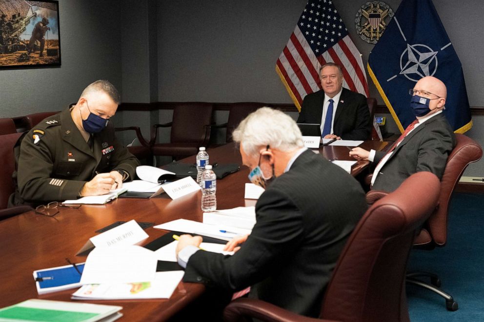 PHOTO: Secretary of State Mike Pompeo, rear, participates in a virtual NATO Foreign Ministerial from the U.S. Department of Defense on Dec. 1, 2020, in Washington, D.C.